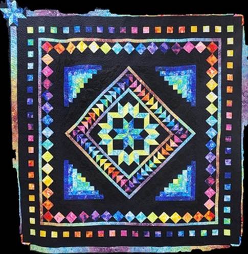 A colorful quilt with a black border

AI-generated content may be incorrect.